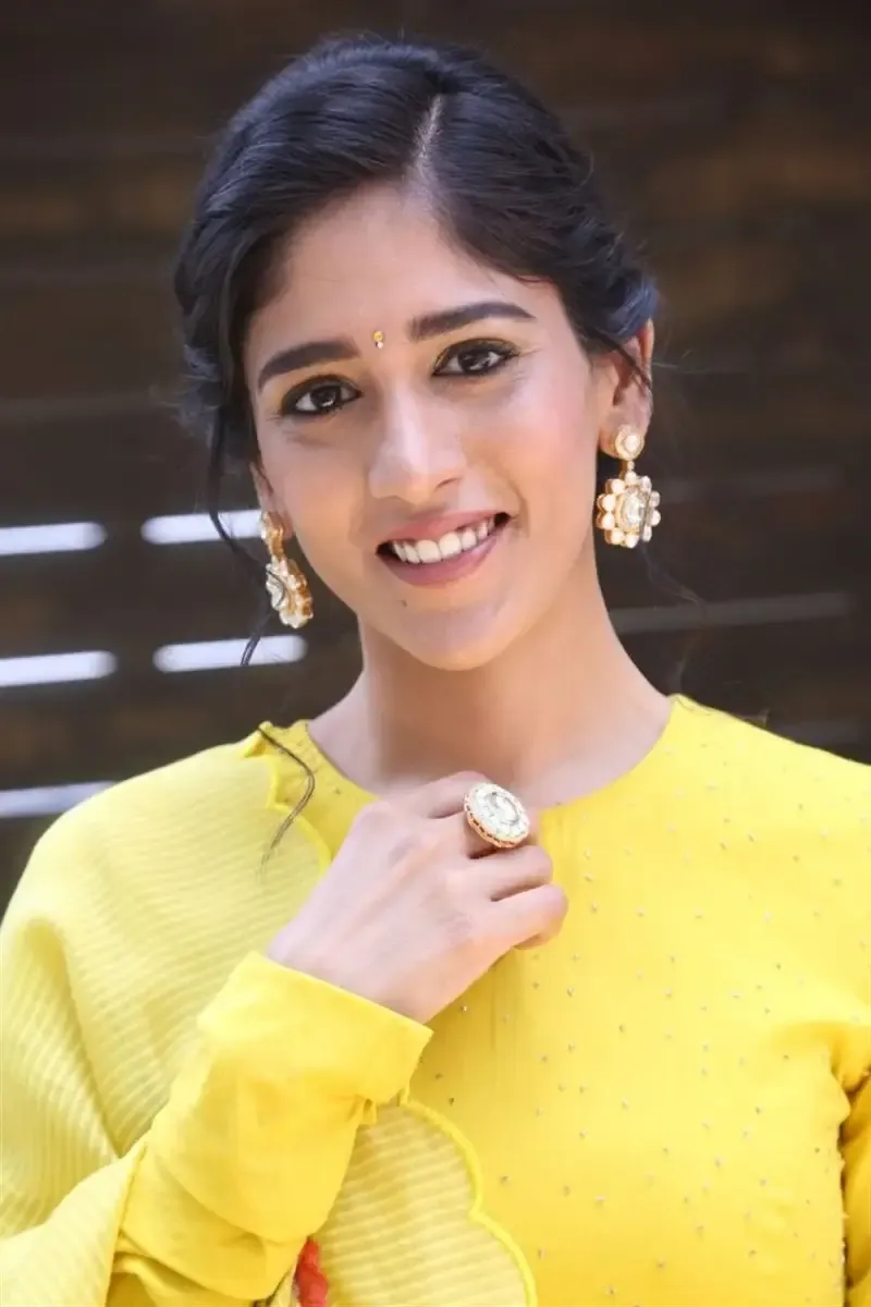 ACTRESS CHANDINI CHOWDARY IN YELLOW DRESS AT MOVIE TEASER LAUNCH 3